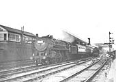 British Railways Standard Class 7MT No 70029 'Shooting Star' passes Rugby No 4 signal cabin on a down express in 1962