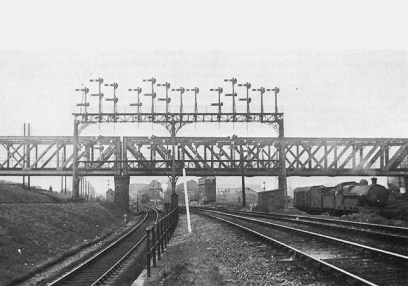 Another view of Rugby's signal gantry showing the main down line on the left and on the right the line to the shed's turntable