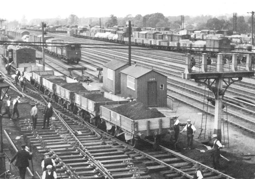 Close up showing two of the timber buildings erected for use by the staff shunting the down sidings