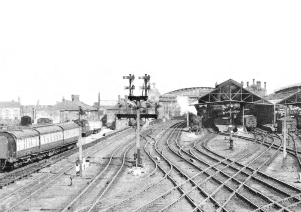 Close up showing from left to right the up and down engine line, the up goods and the up through main