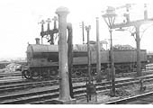 An unidentified ex-LNWR 4-6-0 Princess of Wales class locomotive is proceeding north along the engine line from the shed