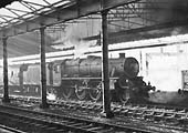 An unidentified ex-LMS 5MT 4-6-0 locomotive has just arrived in Platform 8 with a train from Northampton