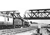 Ex-LMS 5XP 4-6-0 No 45726 'Vindictive' passes beneath the GC bridge with an express train on the Northampton line