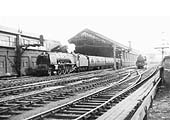Ex-LMS Princess Coronation Class 4-6-2 No 46240 'City of Coventry' is about to depart  from Platform 1 circa 1962
