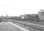 Ex-LMS 8F 2-8-0 No 48200 passes through Rugby on an up class 8 mineral train on 23rd July 1956