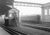 Rugby No 2 Signal Cabin seen in the early 1950s with an ex-LNWR Elliptical Roof Corridor Slip Coach stabled behind it on a siding