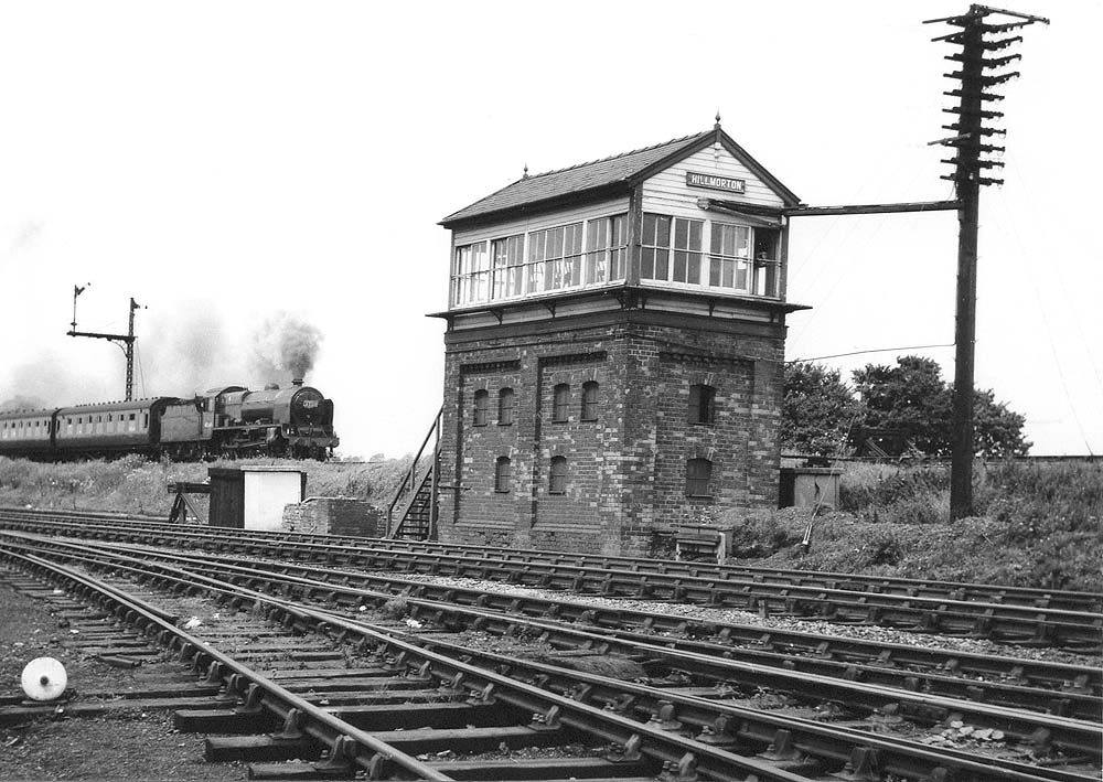 View of Hillmorton Signal Cabin as ex-LMS 5XP 4-6-0 Patriot Class No 45549 passes on an up Northampton express