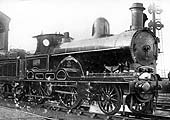 LNWR 2-2-2-0 Teutonic Class No 1303 stand on the up refuge siding by platform 2 at Rugby station