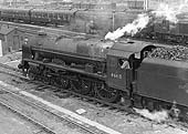 Ex-LMS 6P 4-6-0 Royal Scot Class No 46115 'Scots Guardsman' is seen shunting Rugby's goods yard in 1963