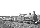 LNWR 0-8-0 C1 Class No 1851, fitted with a small boiler, is seen on an up coal train at Clifton Road Junction circa 1922