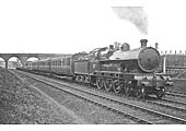 LNWR 4-6-0 Claughton Class No 150 'Illustrious' with an up Manchester exoress near Clifton Road Junction circa 1921
