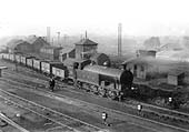 LNWR 0-8-2T No 2348 is seen shunting a rake of coal wagons in Rugby's up exchange sidings