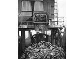 View of an unknown locomotive being coaled at Rugby's LMS coaling plant built in the 1930s