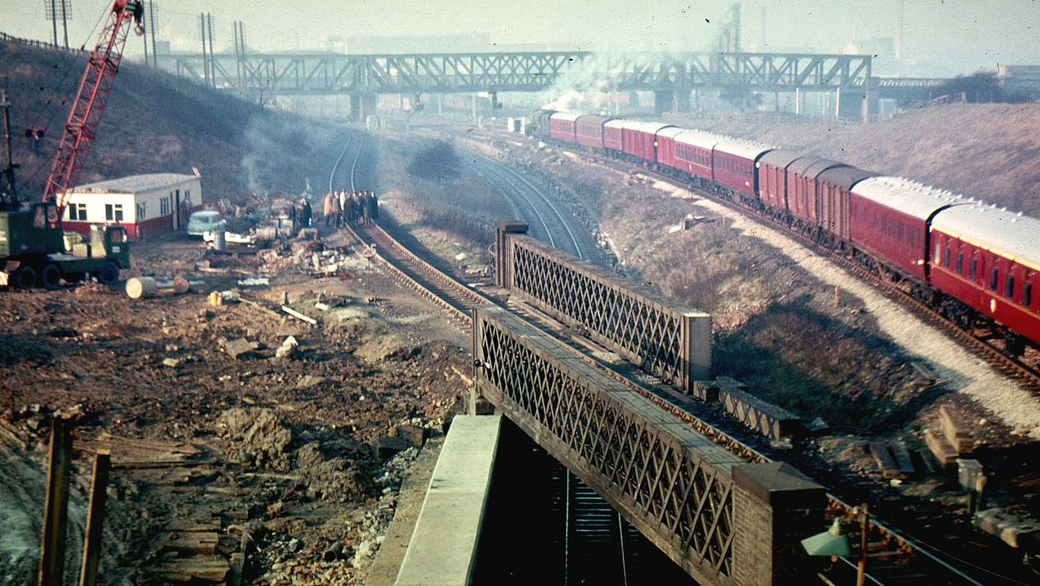 Looking towards Rugby station as the ex-LMS Coronation Class locomotive approaches the Great Central bridge