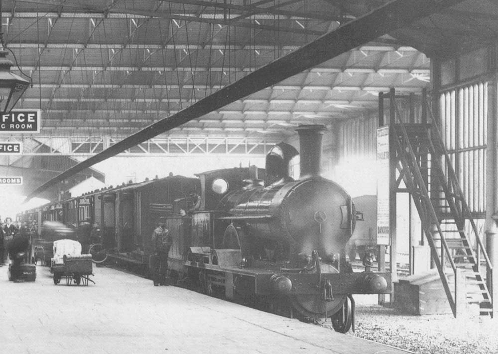 Ex-LMS 4-6-0 Black 5 No 44945 stands inside Rugby shed with an assortment of other ex-LMS locomotives