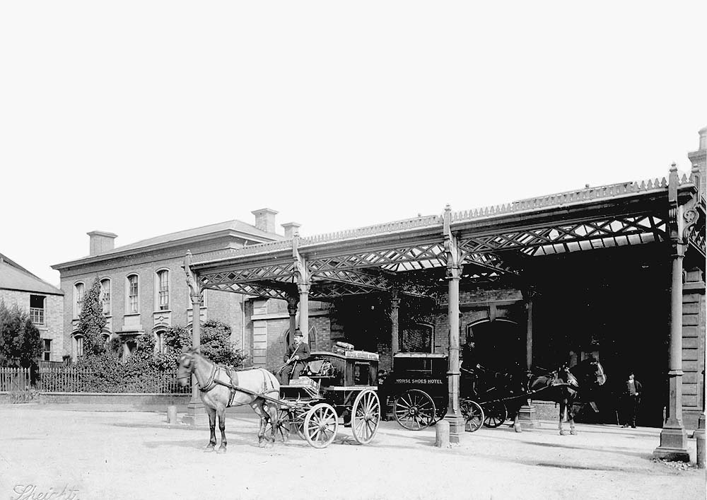 Rugby's second station with its three bay porte cochère plays host to two 'Clarence' four-wheeled carriages