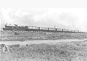 LNWR Precursor class 4-4-0 No 2064 'Jason' stands on the down Northampton line approaching Hillmorton Signal Cabin