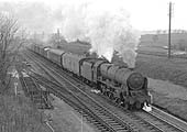An unidentified rebuilt Royal Scot locomotive passes Hillmorton Sidings on an up Class C working circa 1960