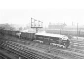 British Railways built 10001, sister engine to LMS 10000, passes by Rugby station's goods yard on a down goods service in 1950