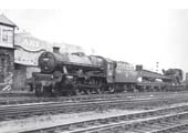 Ex-LMS 5MT 4-6-0 No 45669 'Fisher' passes Rugby No 5 Signal Cabin with with the shed's breakdown train in 1961