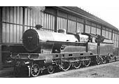 Ex-LNWR 4-6-0 'Claughton Class No 5933 stands alongside Rugby's train shed ready to take forward an express service