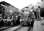 British Railways 4-6-2 Britannia Class No 70032 'Tennyson' stands alongside British Railways built Ivatt 2MT 2-6-2T No 41211 in one of Rugby's north bays