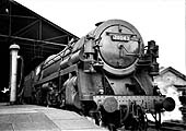 British Railways 4-6-2 Britannia Class No 70043 'Lord Kitchener' stands on an up express service to Euston station