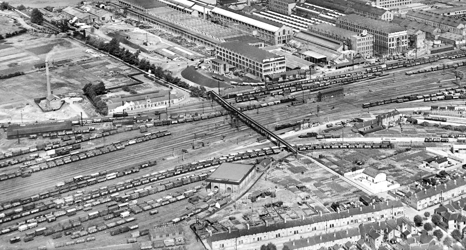 A 1929 panoramic aerial view showing Rugby's northern approaches on the left and the goods yards in the foreground