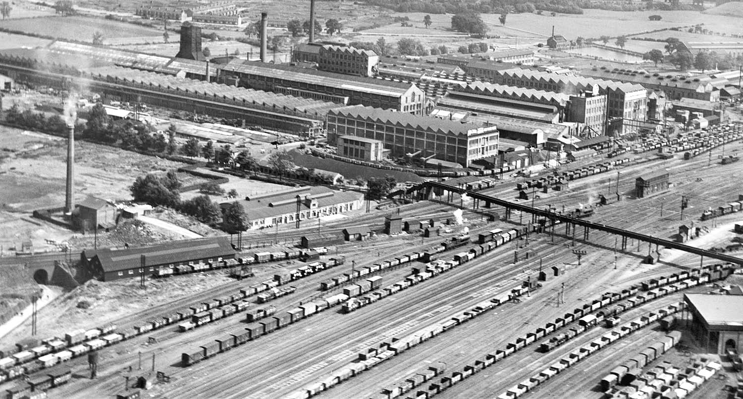A panoramic aerial view of the former Midland Railway's Leicester line entering the northern approach to Rugby station in 1930