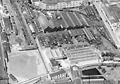 A 1946 aerial view of the former Midland Railway engine shed on the left and Hunter's Wagon works on the right