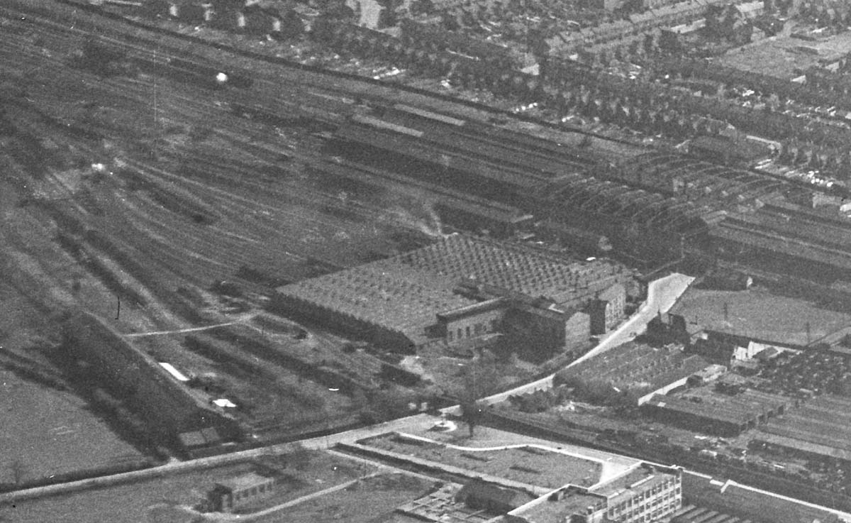 A 1946 aerial view of Rugby shed and the stabling roads in the centre and the station on the right
