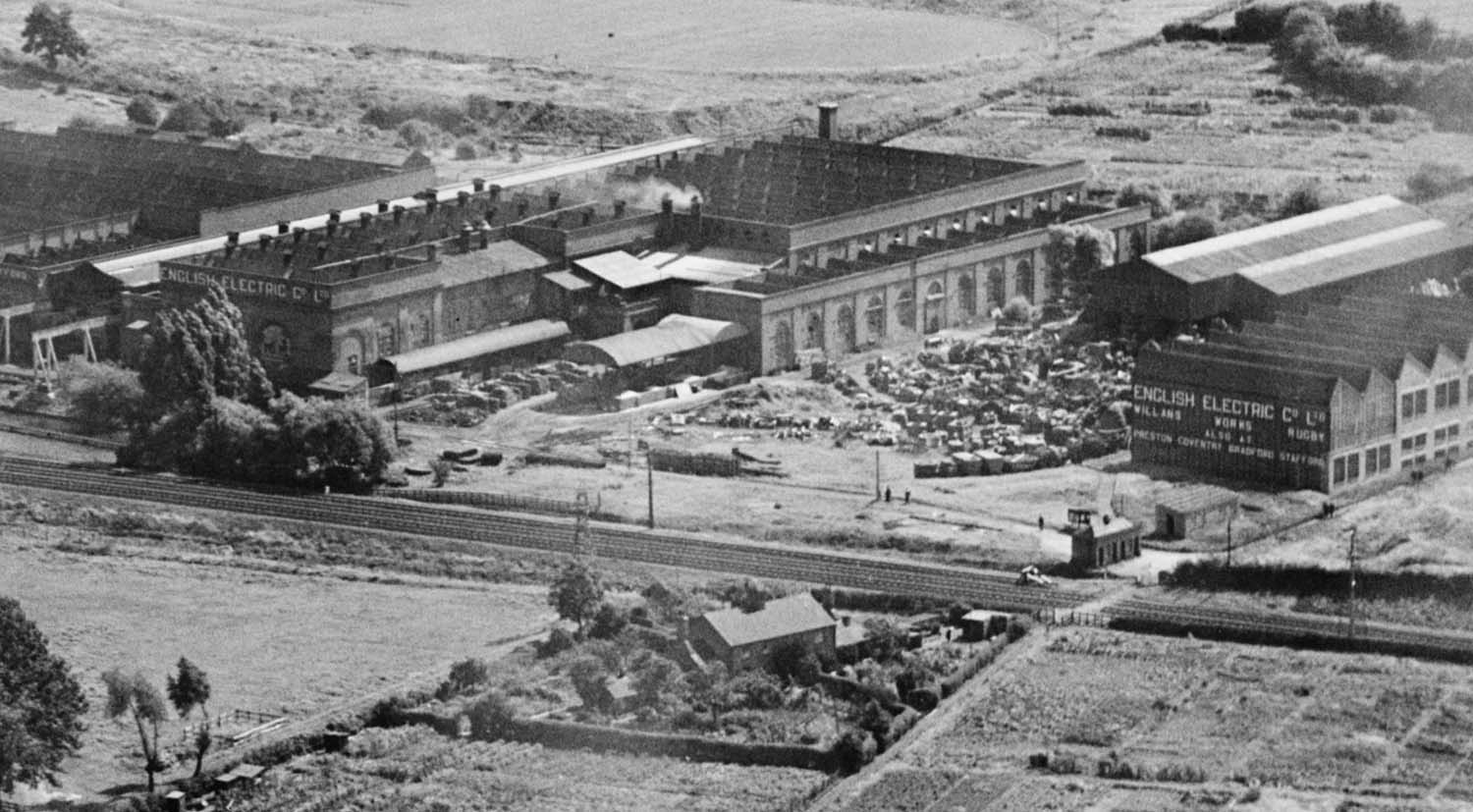 A 1930 aerial view of English Electric Co's Factory with the Rugby to Leamington line passing in front of the works