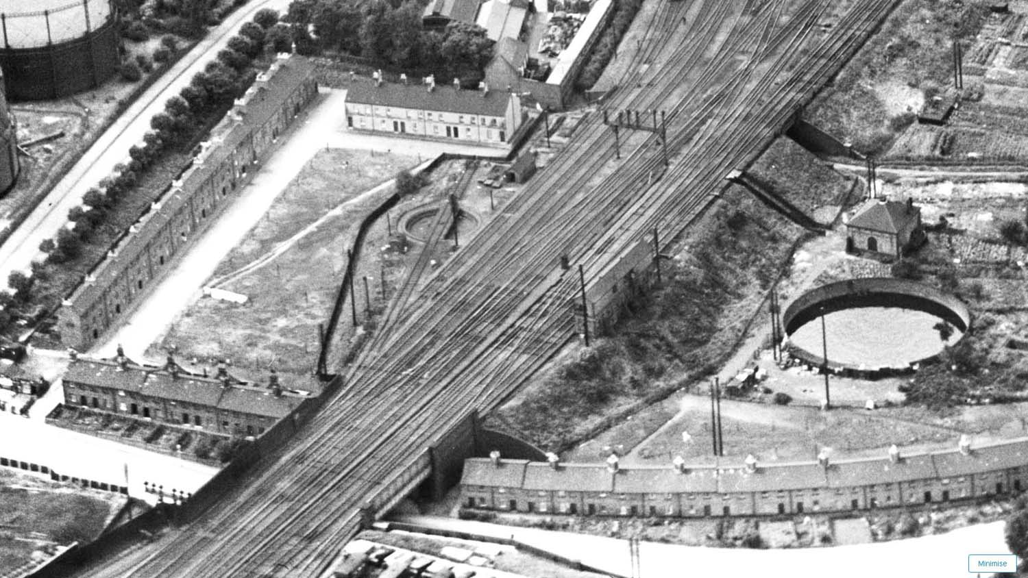 An aerial close up of the bridge carrying the railway over Newbold Road, Old Station Square, the turntable and opposite, the original Rugby No 7 Signal Cabin