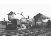 Ex-LMS 4-6-2 Coronation class No 46256 'Sir William A Stanier FRS' is seen at the head of a down express