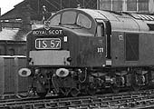 An unknown Type 40 diesel is seen on a down named express as it passes the goods yard