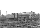Ex-LMS 4-6-0 Black 5 No 45448 stands in line fully coaled and watered ready for service along with others in front of the shed
