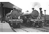 Ex-LNWR 4-6-0  No 5929 'JAF Aspinall and unnamed Claughton No 6016 stand together on the up lines