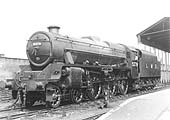 LMS 4-6-0 Stanier Black 5 No 5379 bearing a 2A shed plate stands light engine at the Stafford end of the up platform's avoiding line
