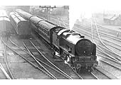 LMS 4-6-0 Royal Scot class No 6111 'Royal Fusilier' with straight smokebox deflectors at the head of an up express