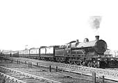LNWR 4-6-0 No 1407 'Lance Corporal Crisher VC' is seen leaving Rugby station on an up express