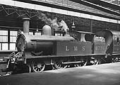 Ex-LNWR 2-4-2T No 6734 stands at the head of a local passenger service to Stafford on 14th june 1838