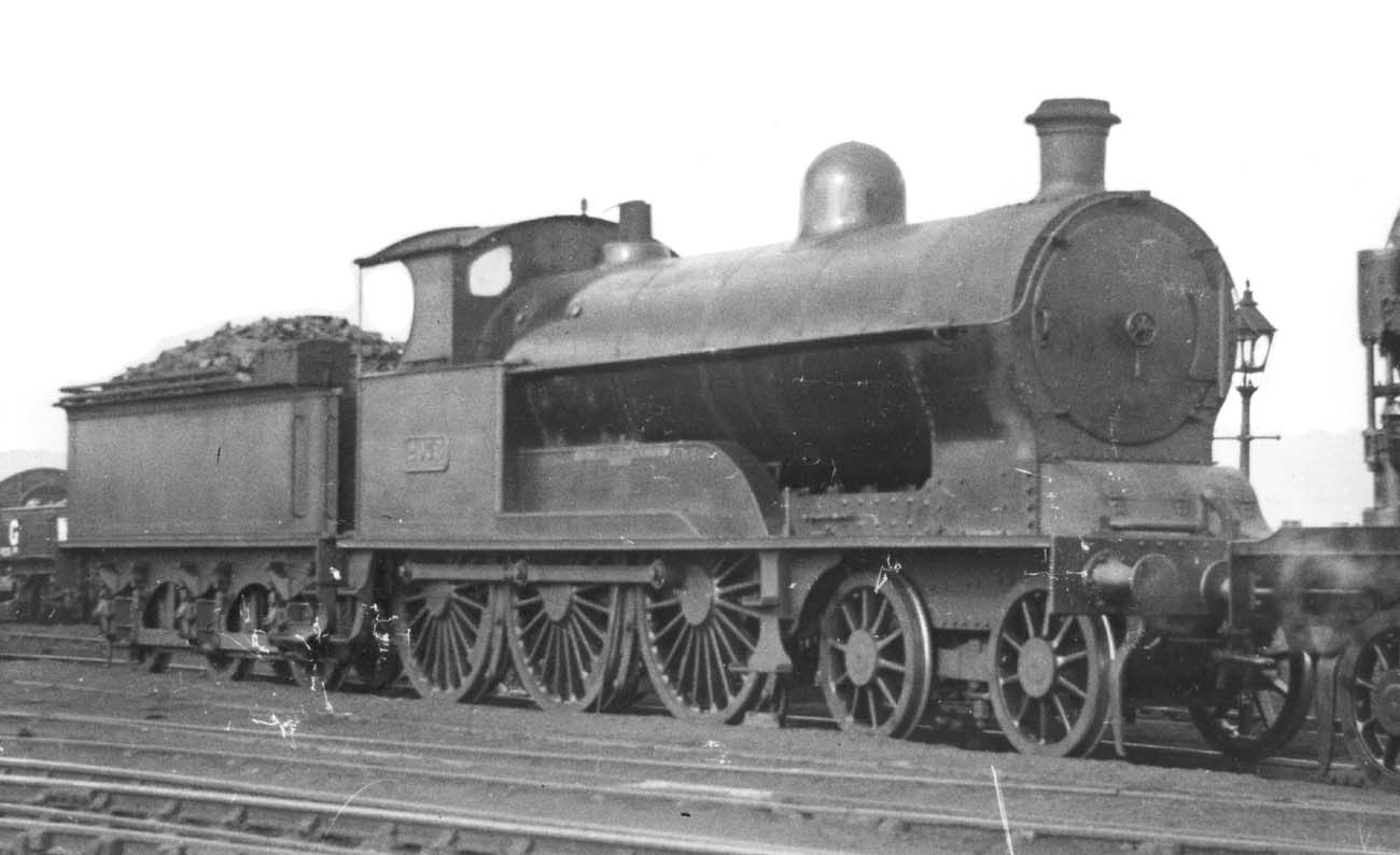 LNWR 4-6-0 Experiment class No 2076 'Pheasant' is seen standing light engine in Rugby's sidings