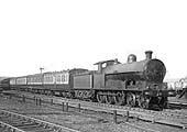 LNWR 4-6-0 Prince of Wales class No 354 is seen leaving Rugby on an up Birkenhead to Euston express