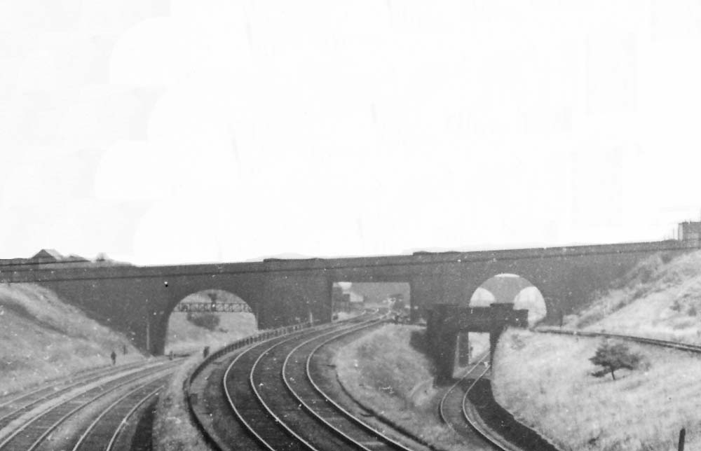Close up of the lines approaching from the south with Clifton Road Junction seen in the distance under the centre bridge