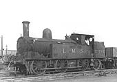 Ex-LNWR 'Coal Tank' 0-6-2T No 27562 is seen shunting in the vicinity of Rugby's goods sidings and yard