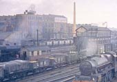 Close up showing in colour Rugby's No 5 signal cabin, the BTH factory and the surrounding railway scene