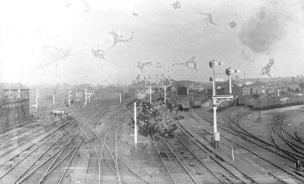 An early 20th century view of the northern approach to Rugby station and on the right its goods yard