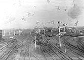 An early 20th century view of the northern approach to Rugby station and on the right its goods yard