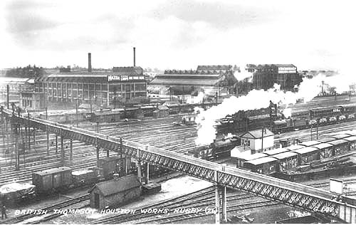 Looking across the northern approach of the station towards the BTH works showing the footbridge and goods trains