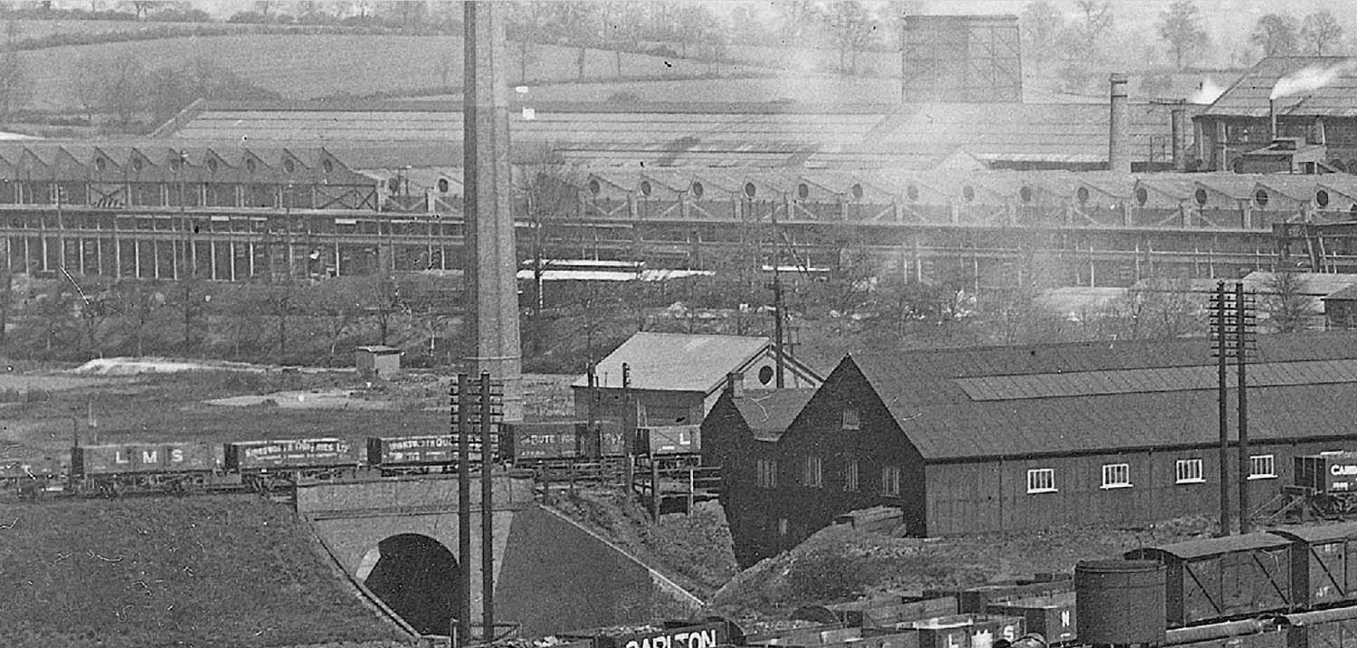 Close up of the Midland Railway line to Leicester showing the Sewage Work's pumping station and boiler house behind